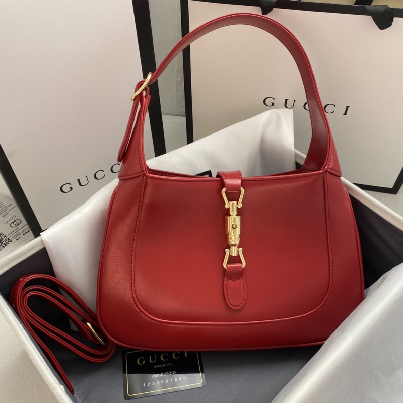 G*u*i top handle bags